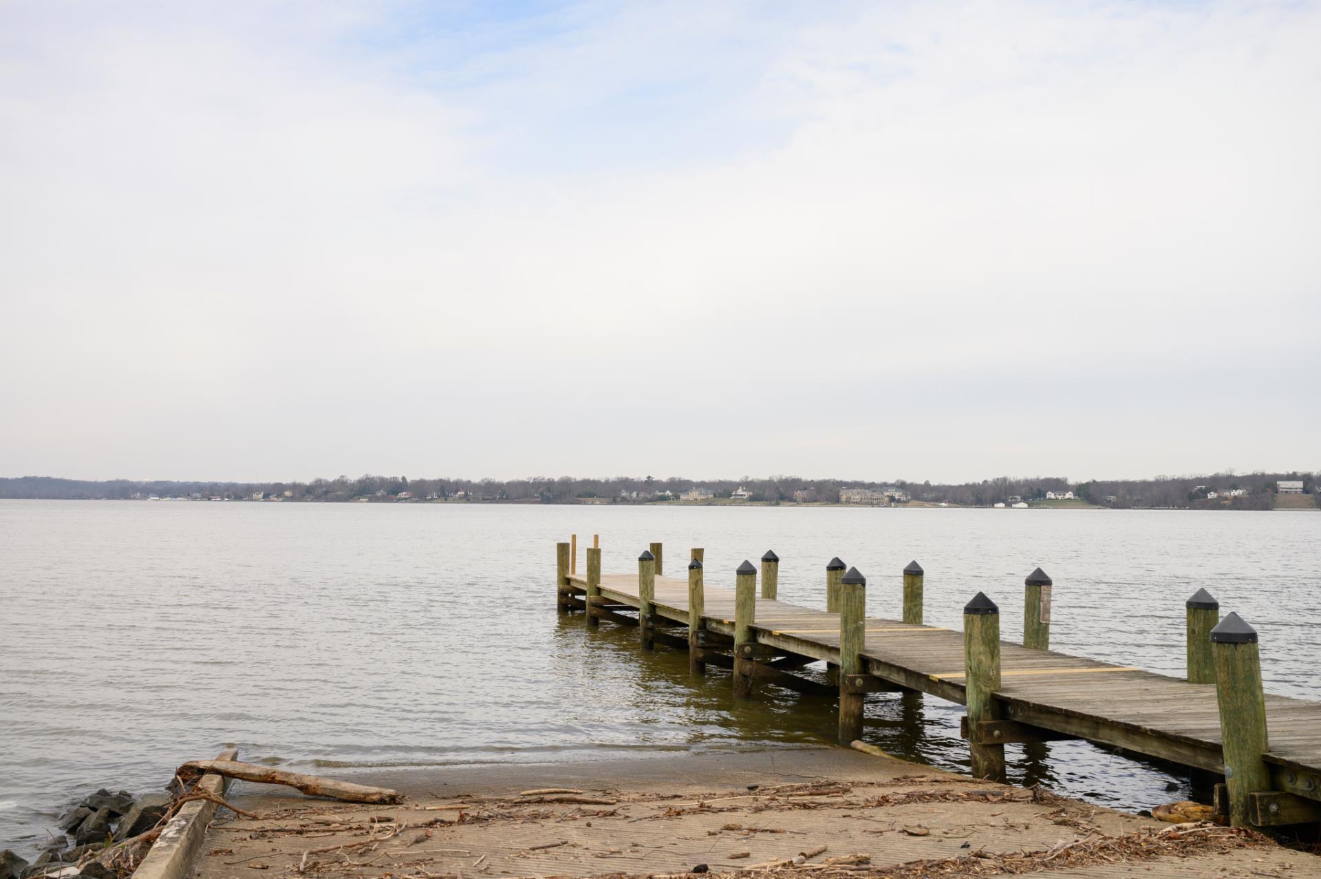 Wooden fishing pier on the Potomac River at Piscataway Park near Bryans Road, Maryland, looking toward Mount Vernon